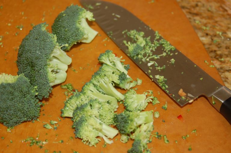 Chop broccoli into small pieces.