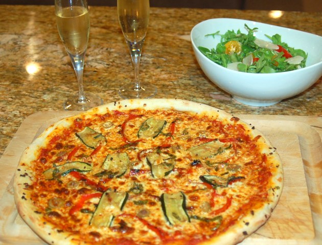 Left over roasted zucchini and bell peppers were also used to make pizza.