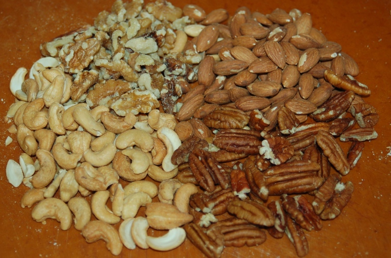 I like a variety of nuts, including walnuts, almonds, pecans and cashews, in my granola.  Choose the combination of you enjoy most.